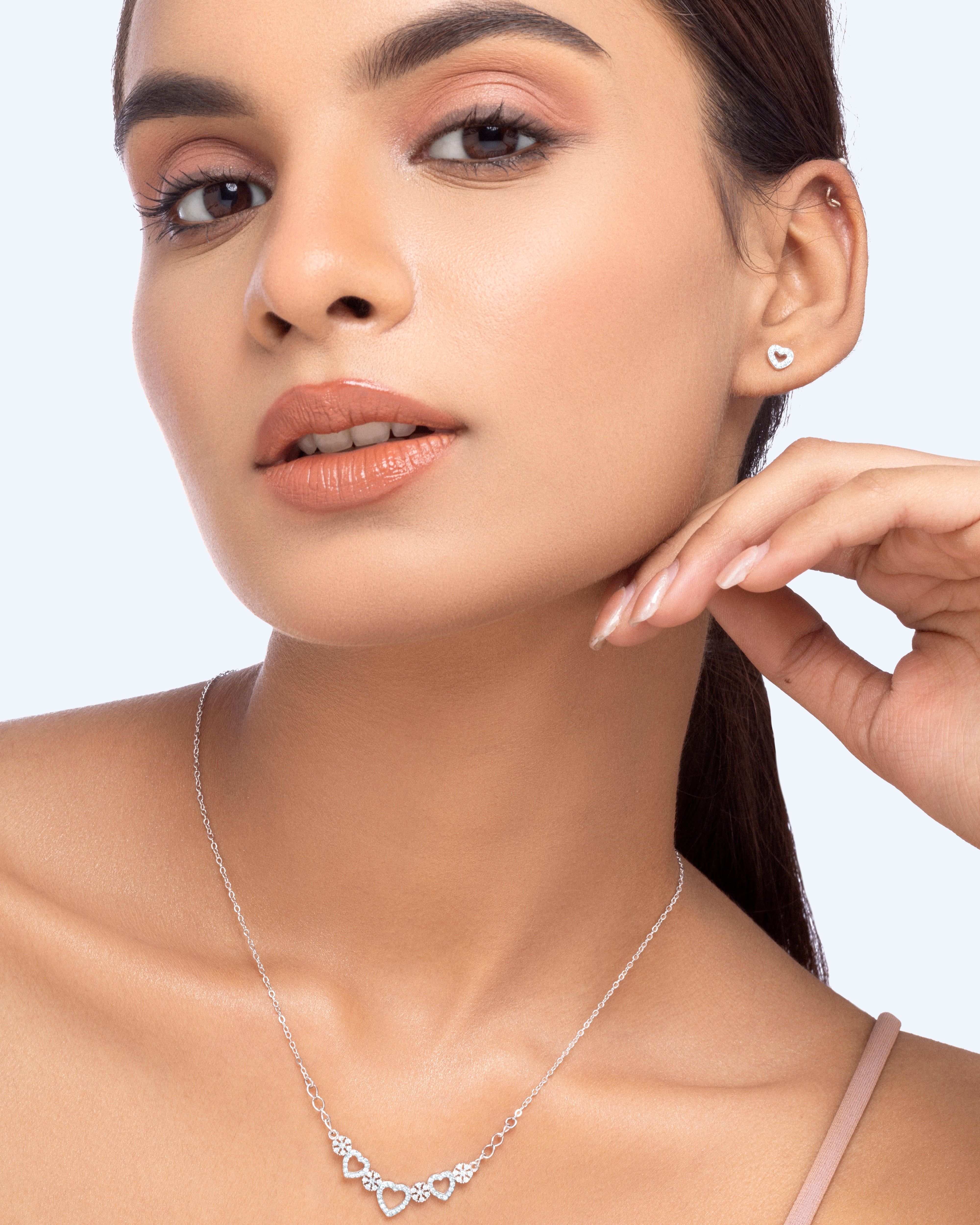 Hollow Heart With Zircon Lining Stud Earrings