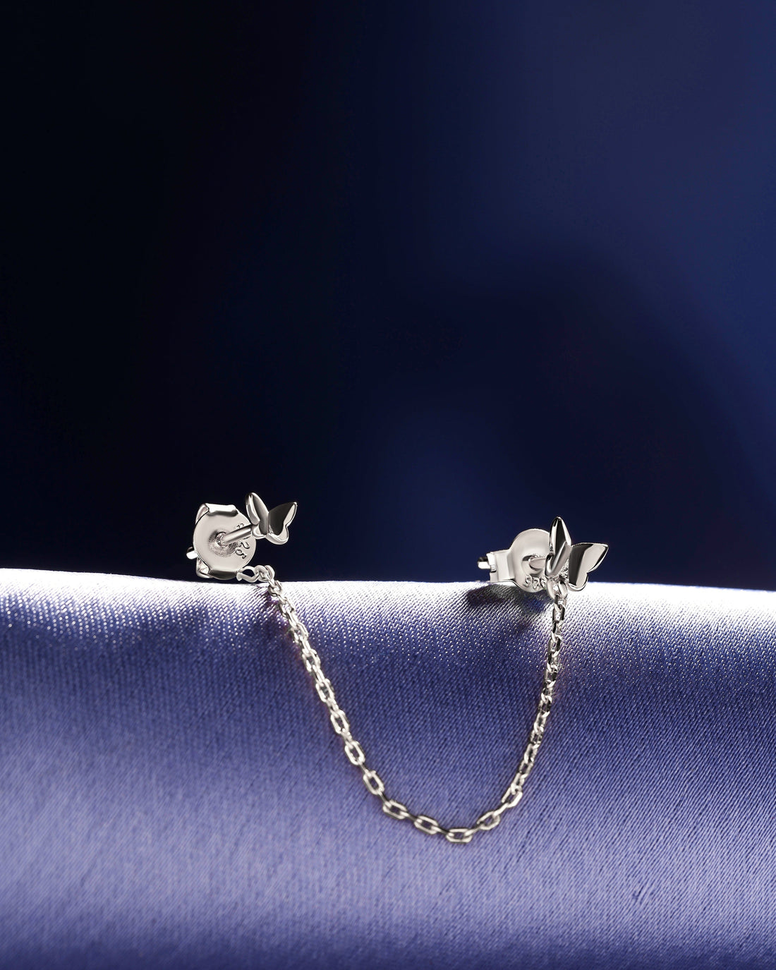 Butterfly Chain Earrings - Dainty Jewelry | 3-in-1 Style featuring sterling silver butterfly studs connected by a delicate chain, ideal for lobe or helix piercings.