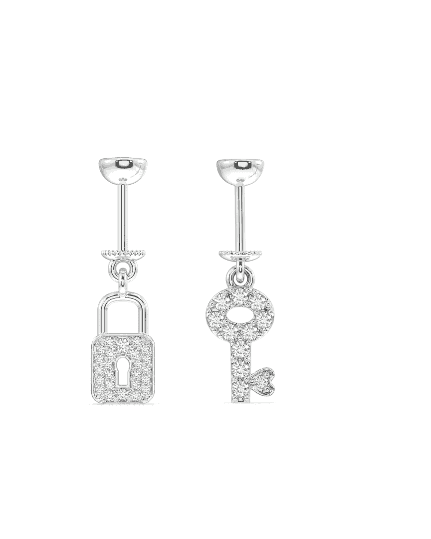 Helix Piercing Hanging earrings featuring mismatched zircon lock and key design in sterling silver. Unique jewelry style for cartilage piercings.