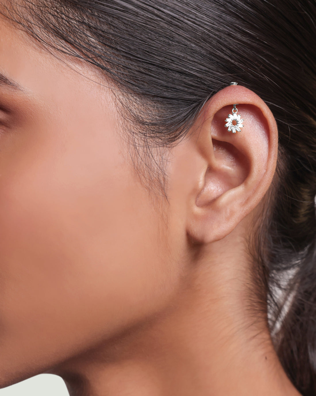 Spiral Baguette Earrings - Snowflake Helix design in sterling silver with hanging baguette-cut stones, perfect for iced ear accessory styling.