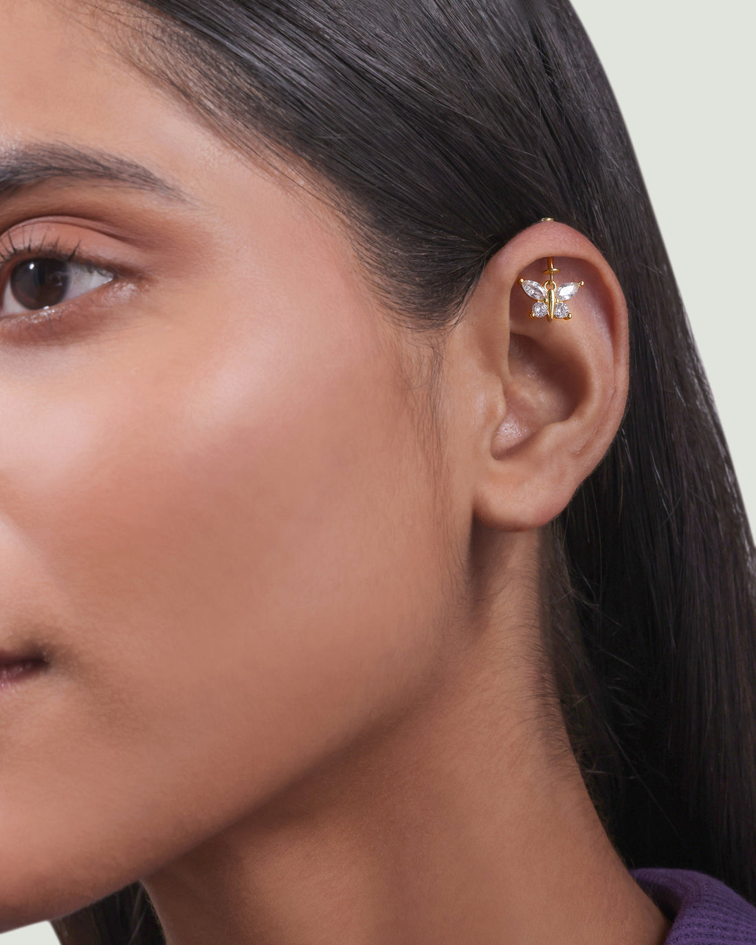 Four Marquise Helix Hanging butterfly piercing earrings in 14k gold with marquise-cut stones, perfect for elegant cartilage styling.