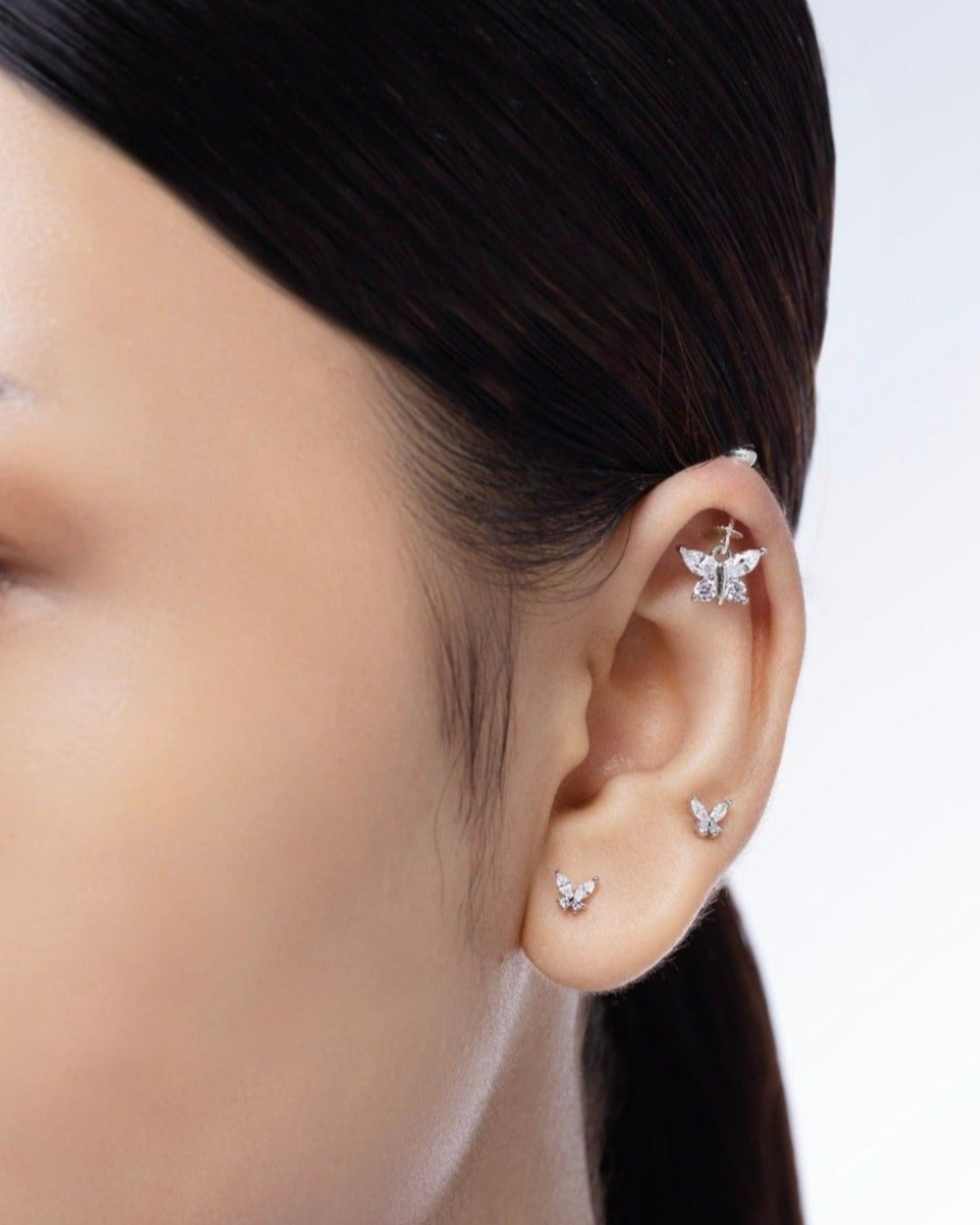 Model Wearing Butterfly Stud Earrings