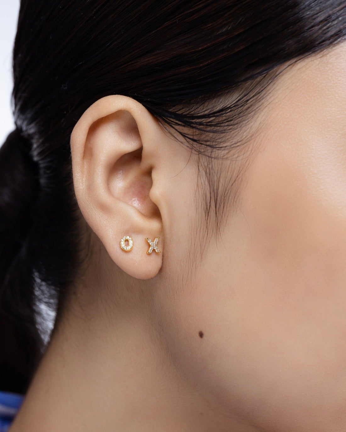 Xo Zirconia Mismatched Stud Earrings