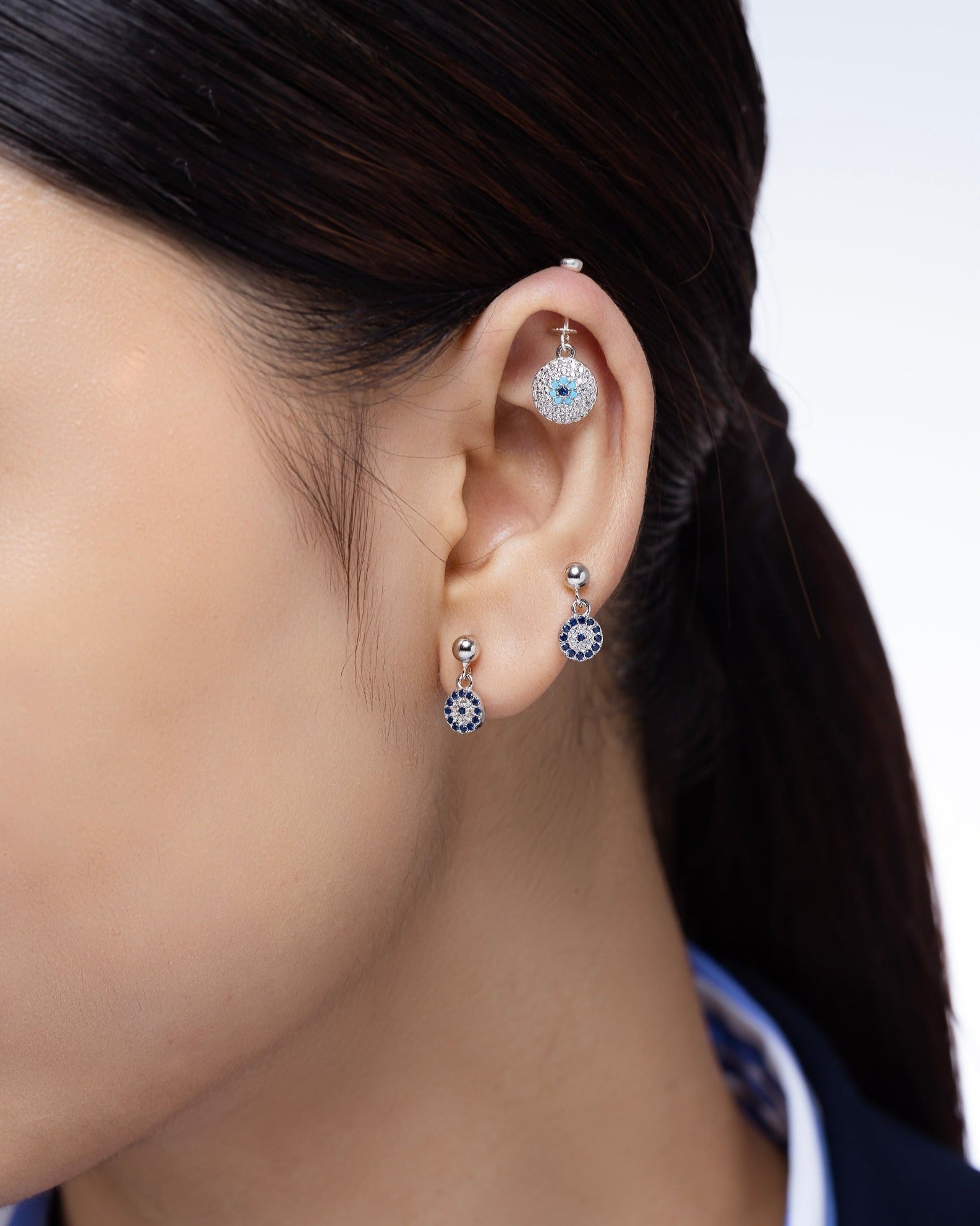 Silver ball with a zirconia eye hanging Ear Shot